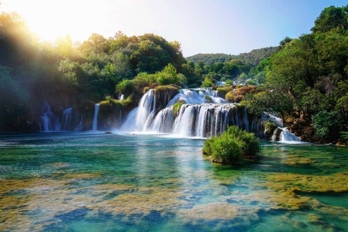 krka waterfalls and sun