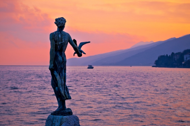 opatija statue and pink sky croatia holidays