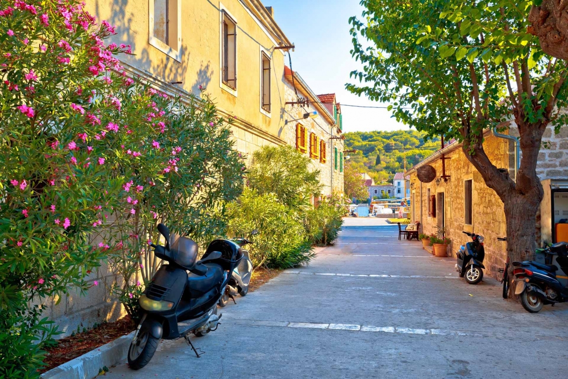 zlarin street with flowers croatia holidays